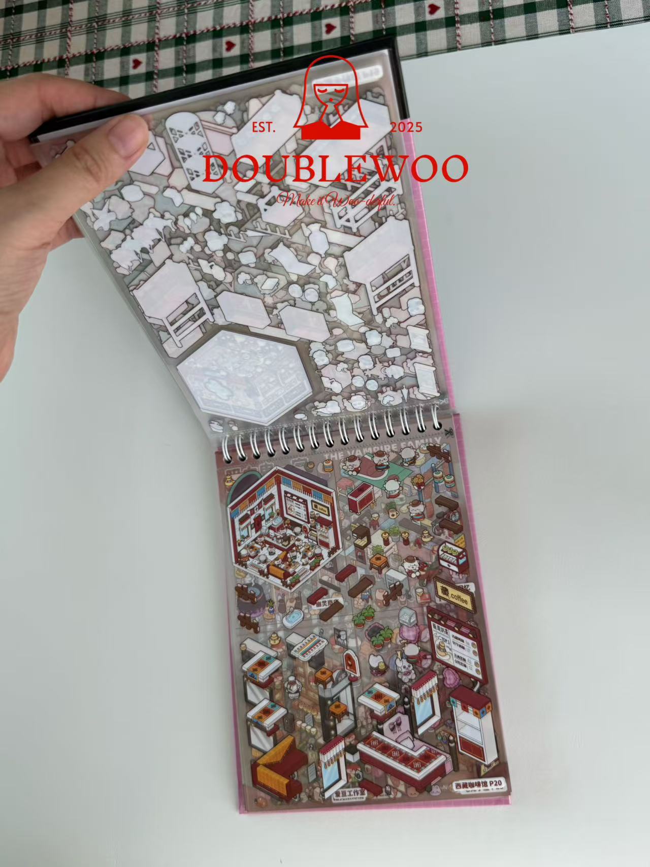 DoubleWoo product with a hand holding it on a white background