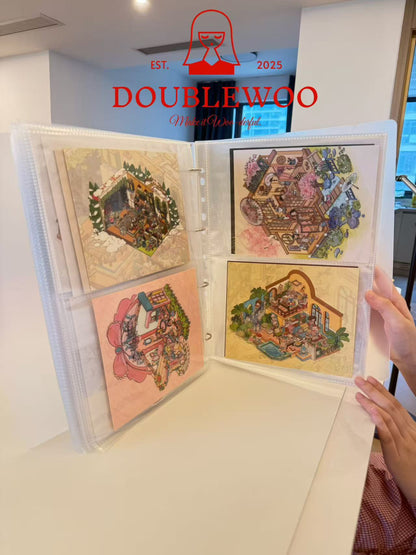 Open album with colorful illustrations held by a person, DoubleWoo logo visible.