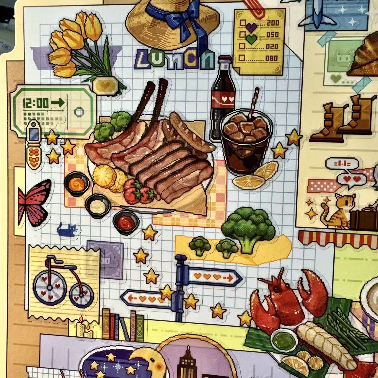 Illustrated lunch scene with steak, vegetables, and drinks on a checkered tablecloth.