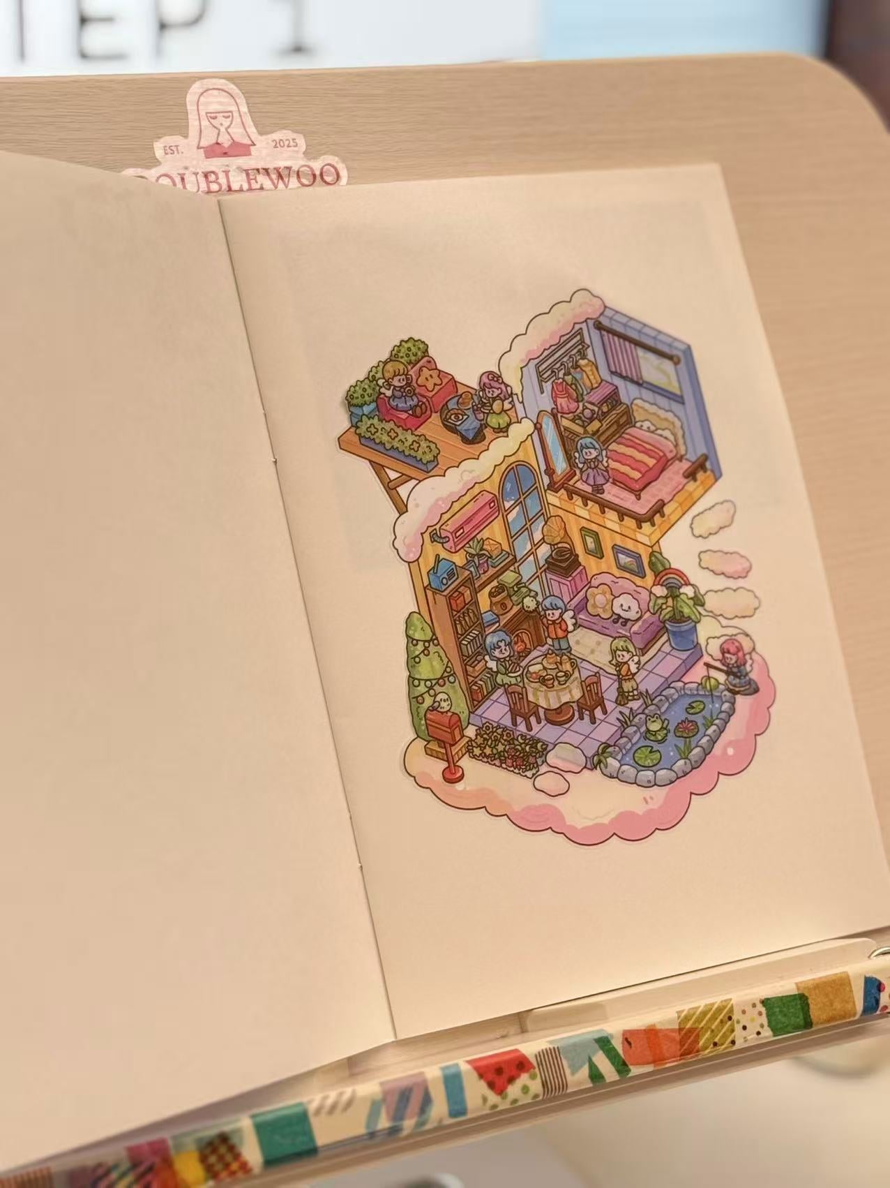 Finished DIY scene – Living in the Clouds sticker set assembled with floating houses and dreamy clouds