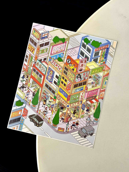 Illustration of a colorful city street scene on a piece of paper.