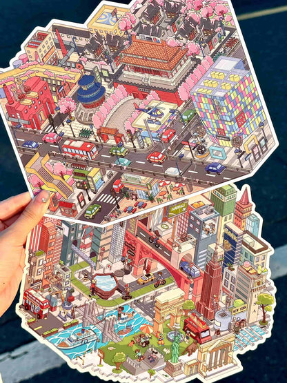 Colorful cityscape puzzle held by a hand with a blue surface in the background