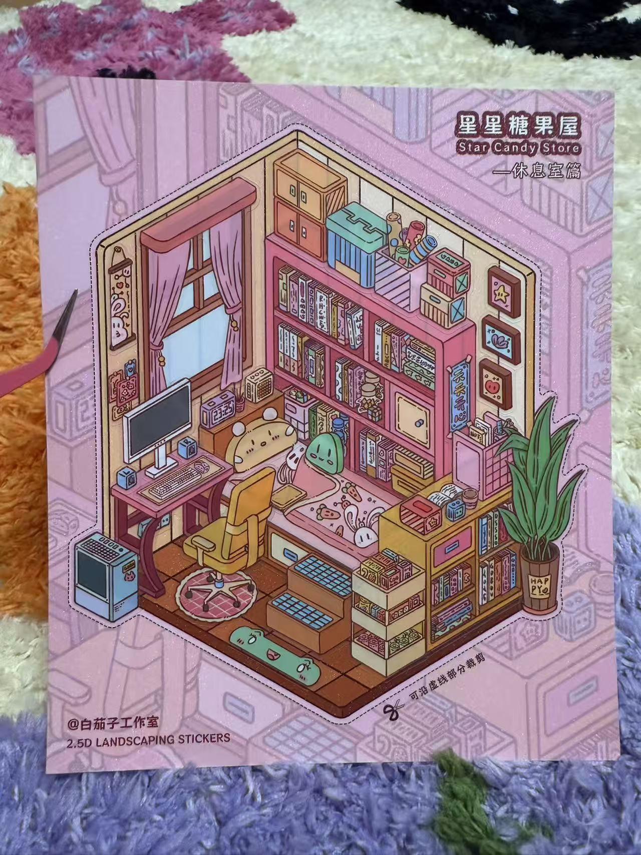 Illustrated sticker sheet with a room scene on a textured surface